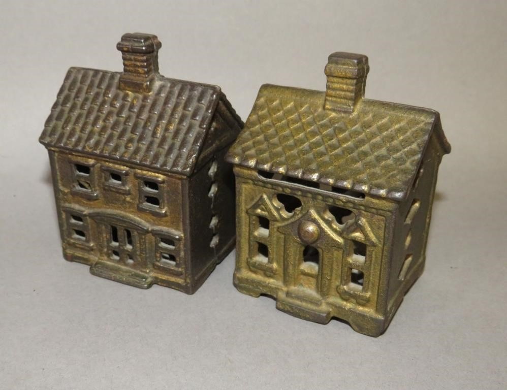 2 CAST IRON HOUSE SHAPED BANKSca.