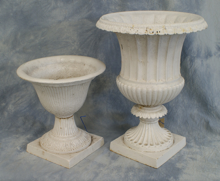 2 cast iron planters, 1 measures