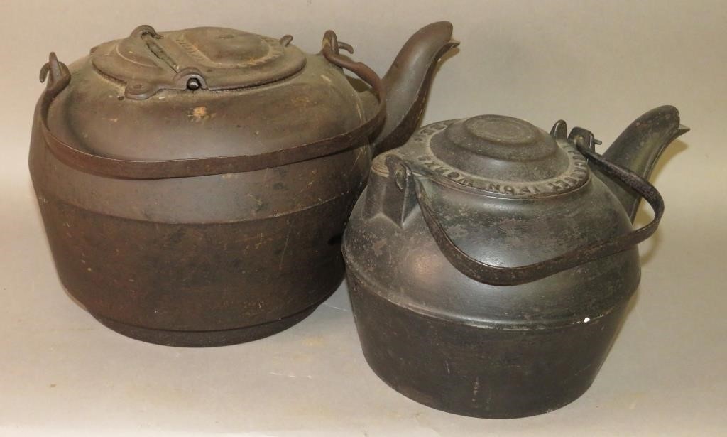 2 CAST IRON TEA KETTLESca.