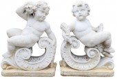 (2) CAST STONE RECLINED PUTTI