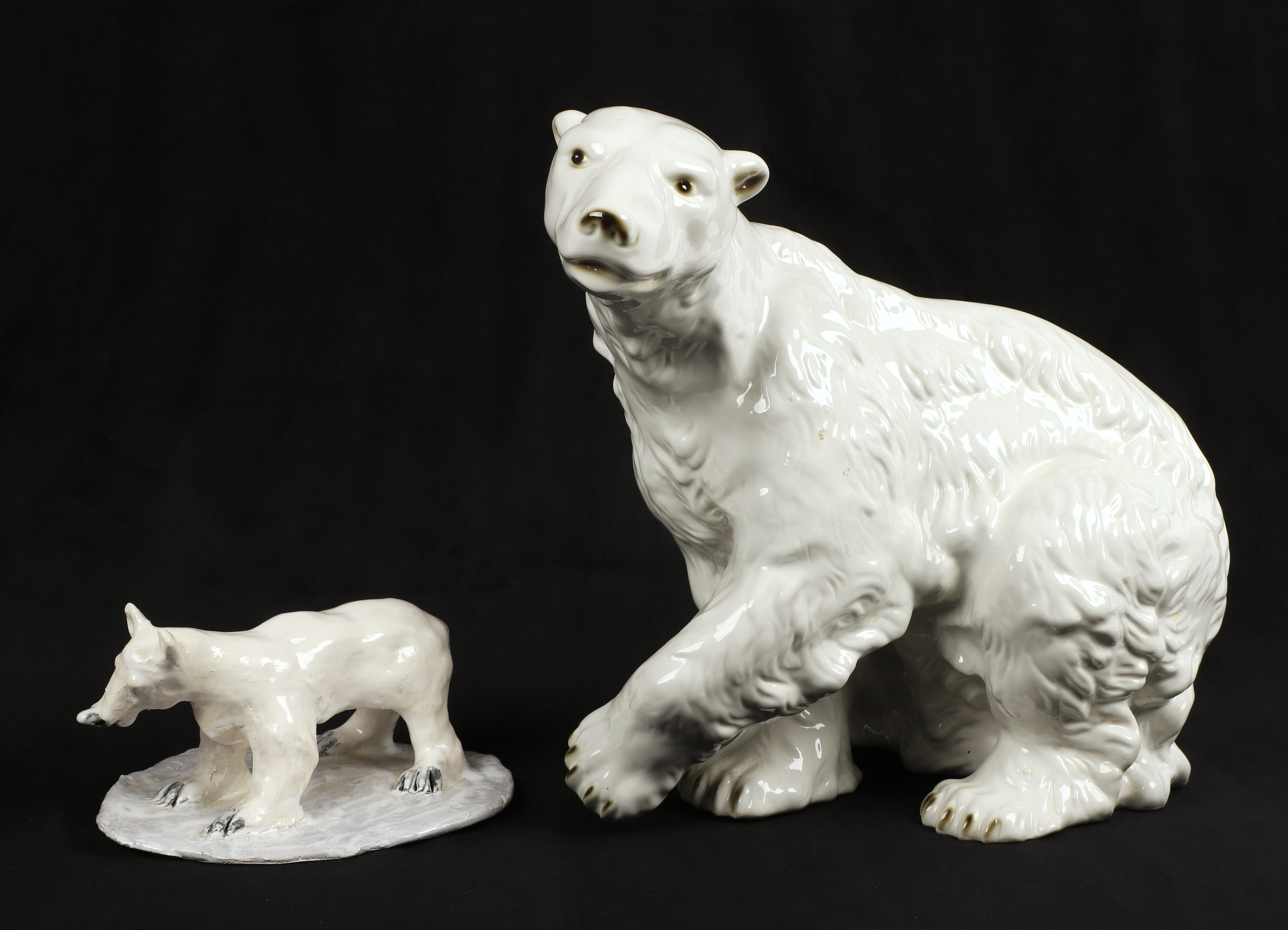 (2) Ceramic polar bear figures, c/o