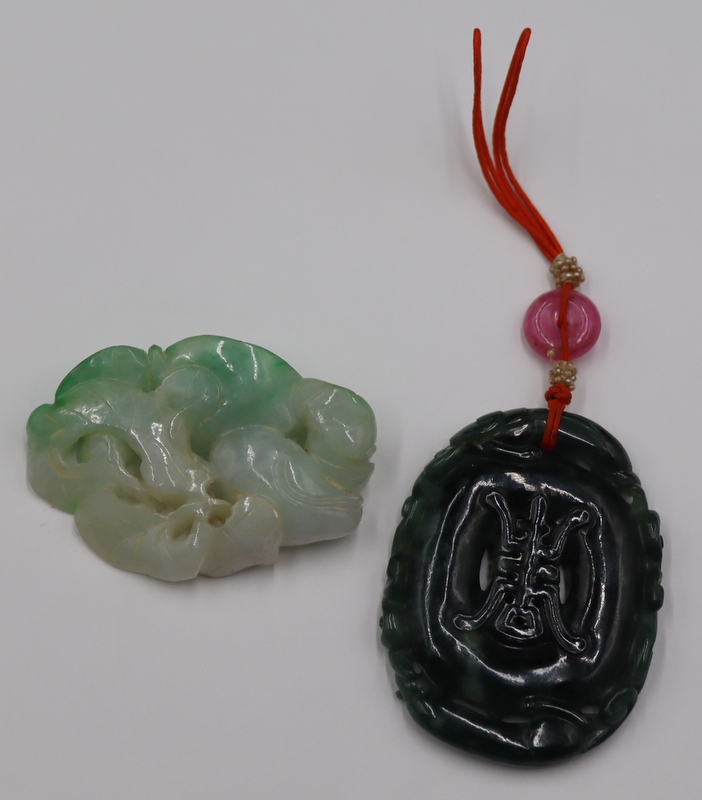 (2) CHINESE CARVED JADE PENDANTS.