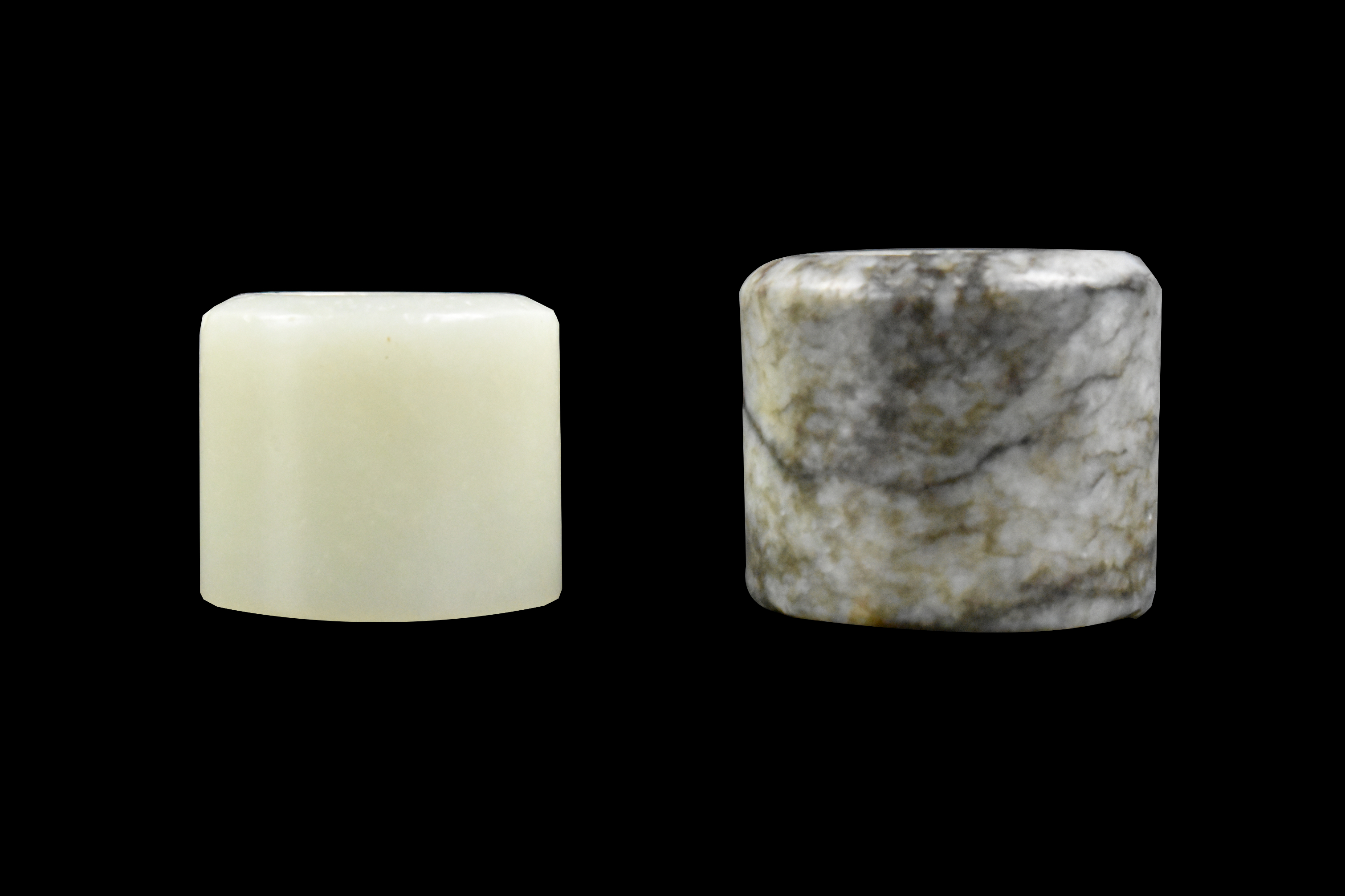 2 CHINESE JADE CARVED ARCHER RINGS,