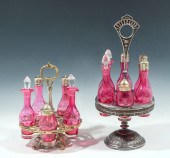2 CRANBERRY GLASS CRUET SETS: