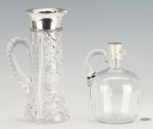 2 CUT GLASS PITCHERS W/ STERLI