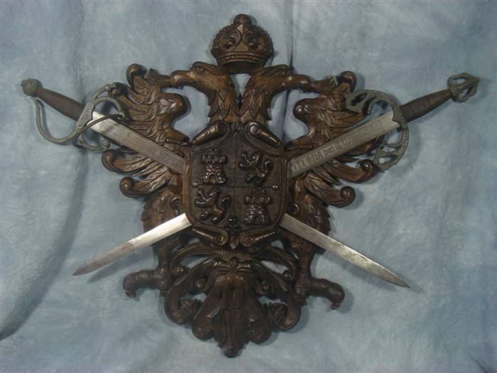 2 decorative wall plaques, carved