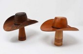2 DELICATELY MADE WOODEN COWBO