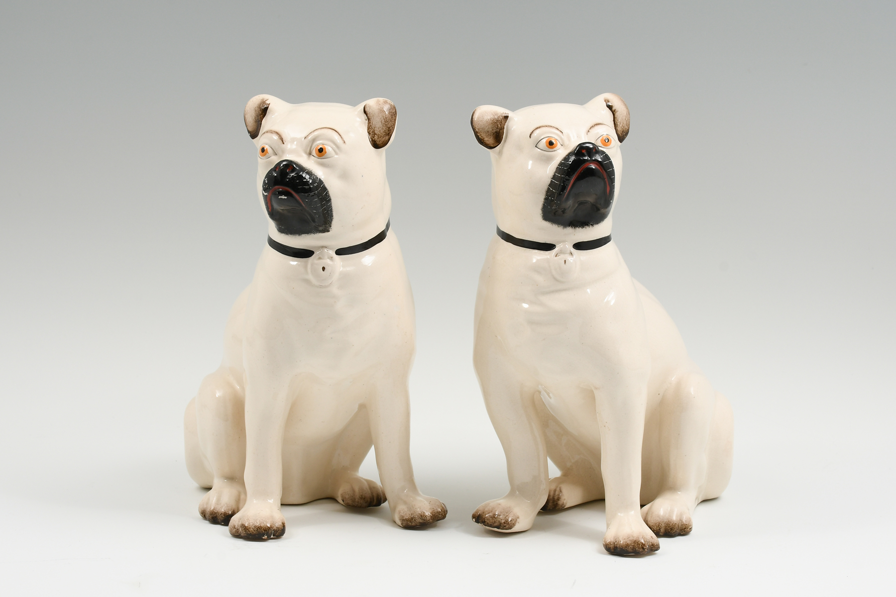 2 ENGLISH STAFFORDSHIRE SEATED