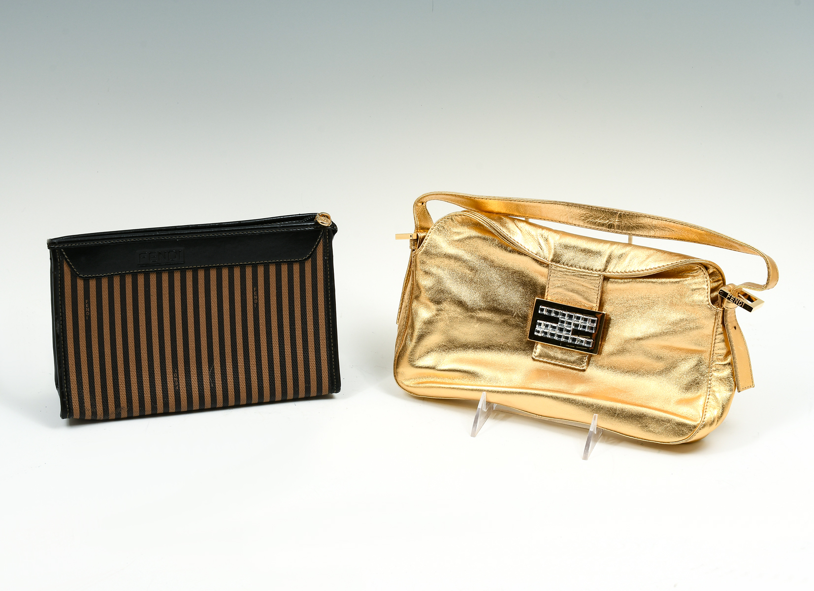 2 FENDI PURSES: 1) Metallic gold