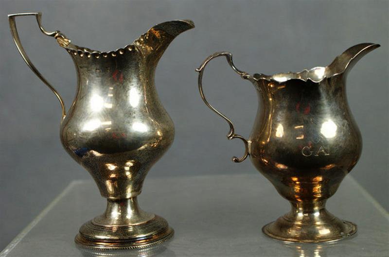 (2) Georgian silver cream pitchers,