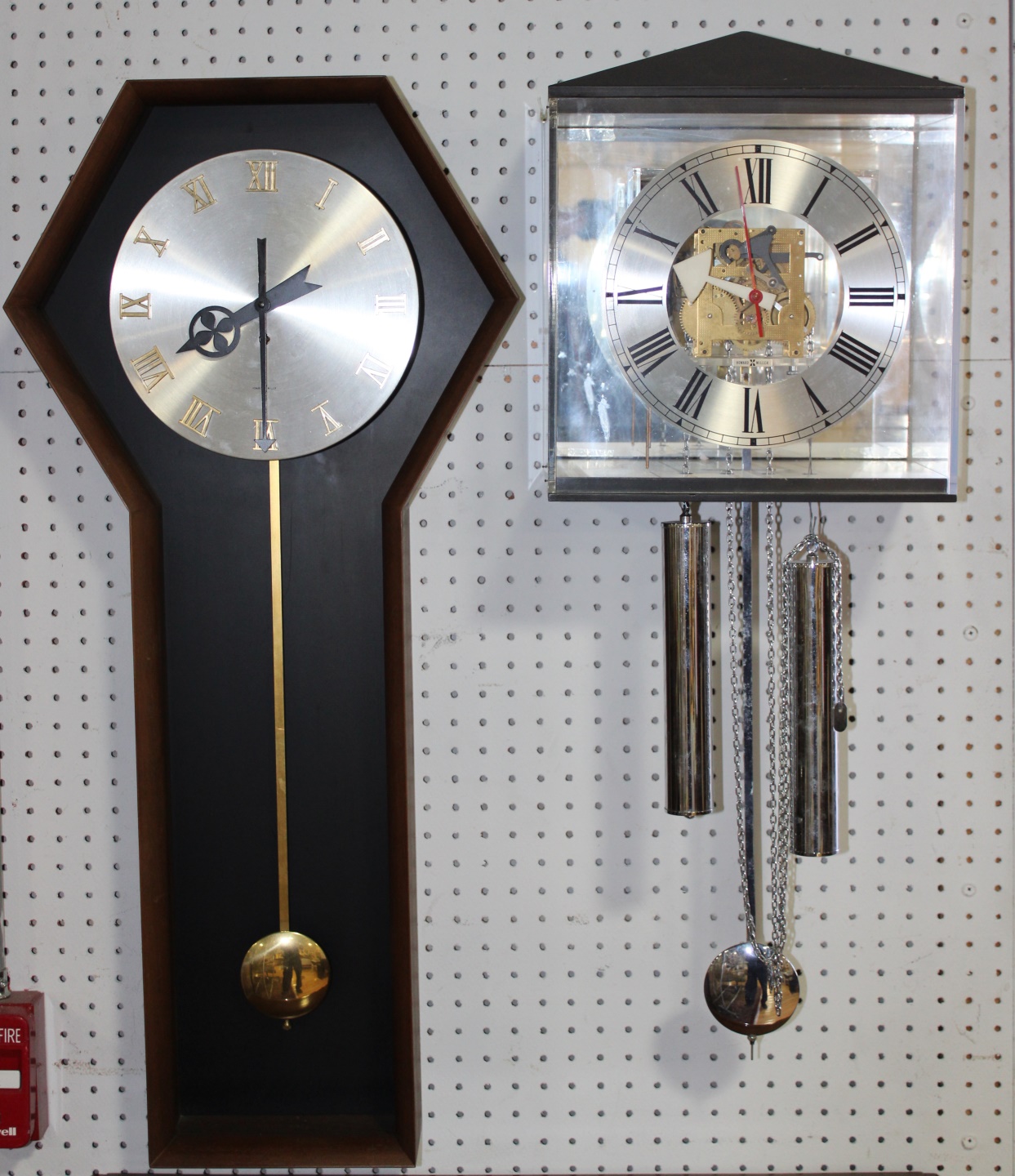 2 HOWARD MILLER CLOCKS. To