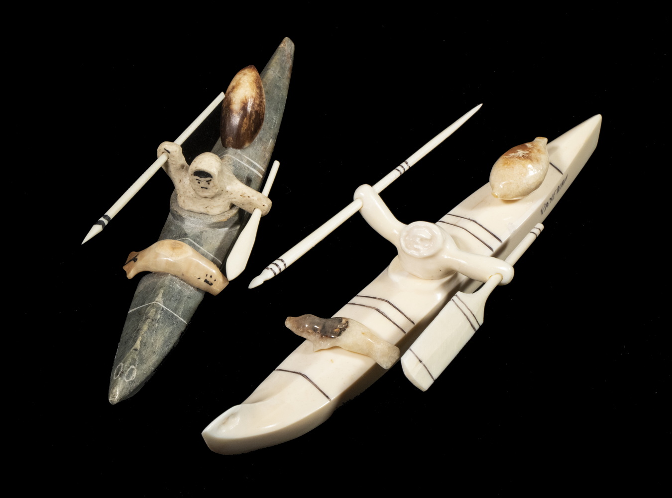 (2) INUIT SCULPTURES OF KAYAKS BY