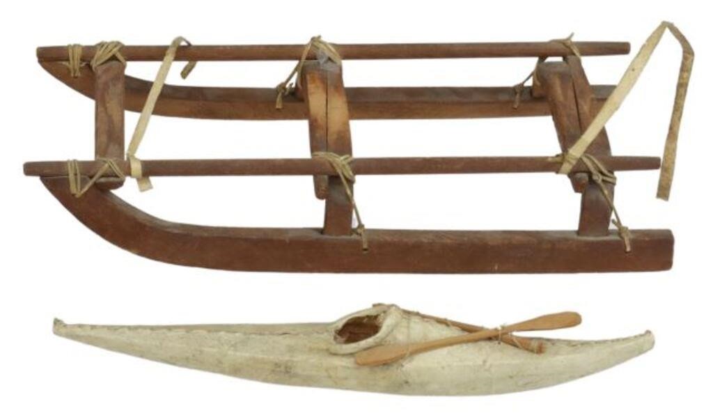 (2) INUIT WOOD & HIDE MODEL OF A