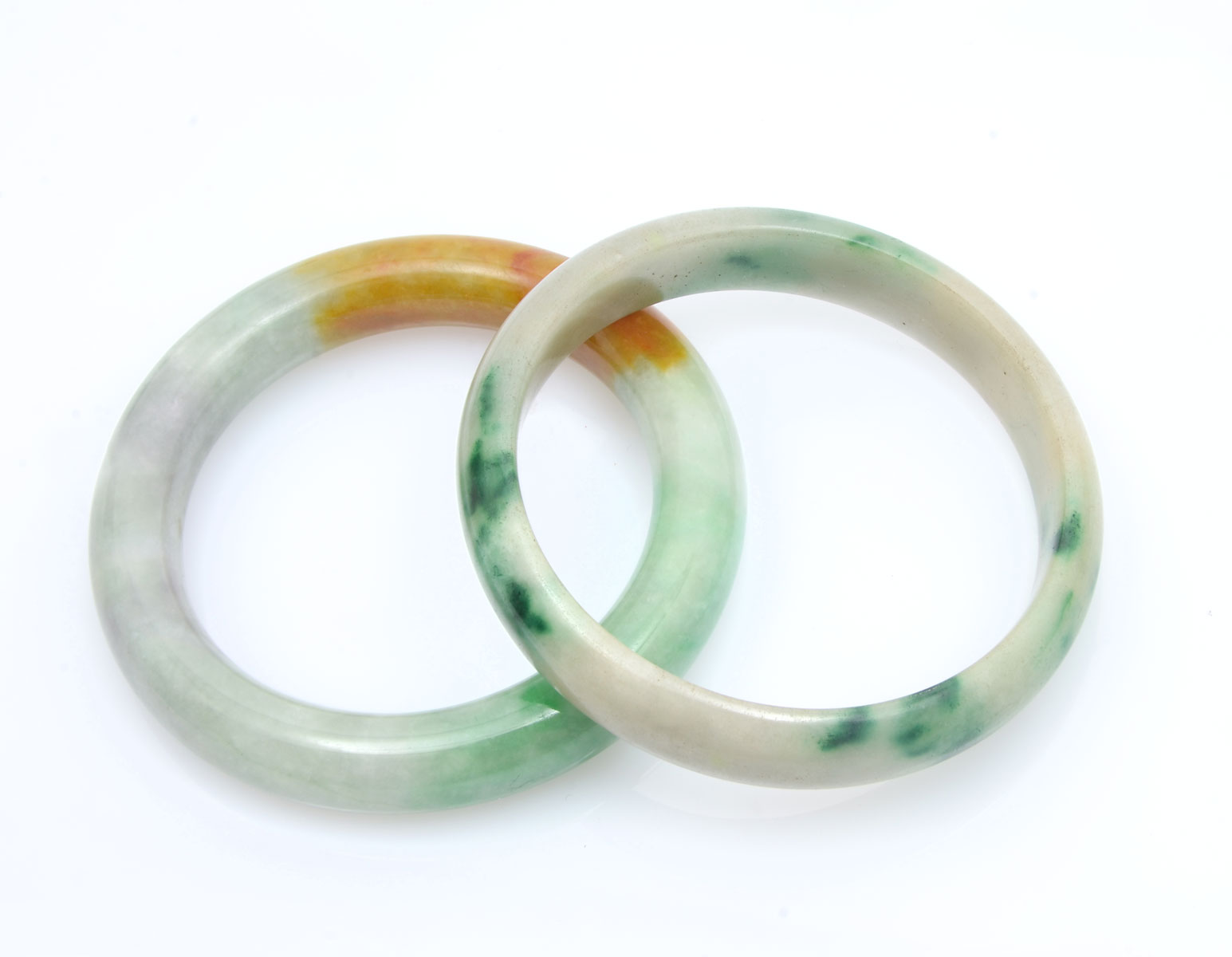 2 JADE BANGLES: 1 bangle is mottled