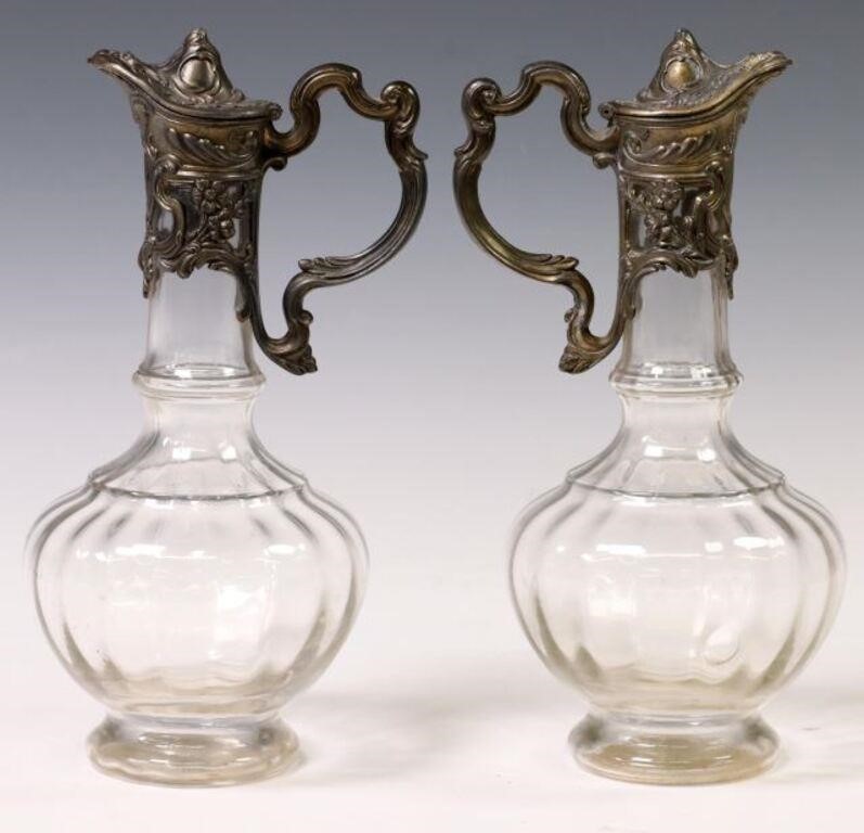 (2) METAL-MOUNTED GLASS CLARET JUGS