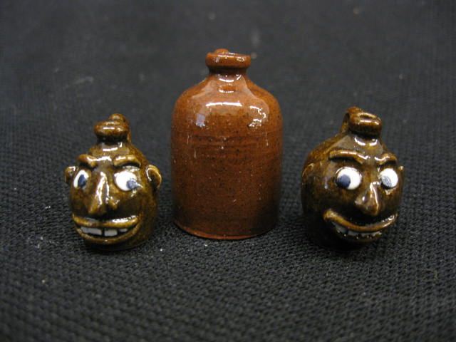 2 Miniature Pottery Face Jugs &