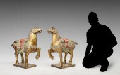 2 OPPOSING CARVED WOODEN CHINE