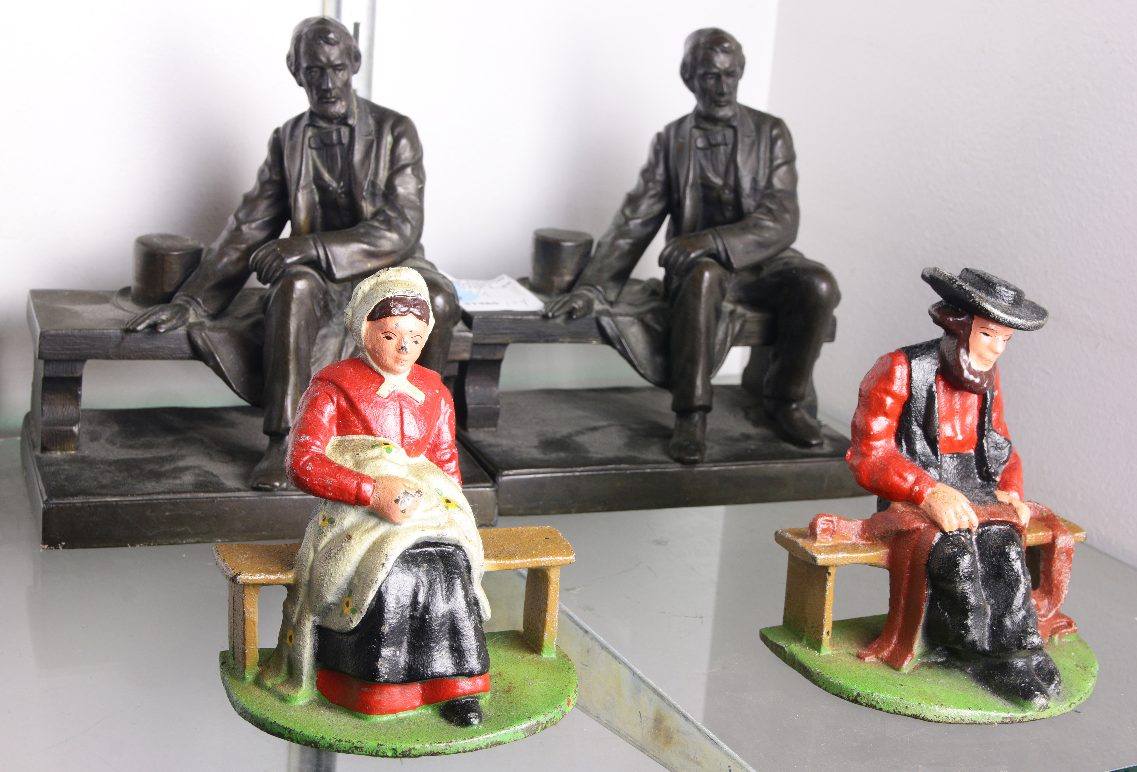 2 PAIRS OF METAL BOOKENDS: ONE OF