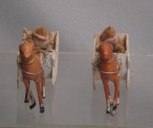 2 paper mache reindeer and San