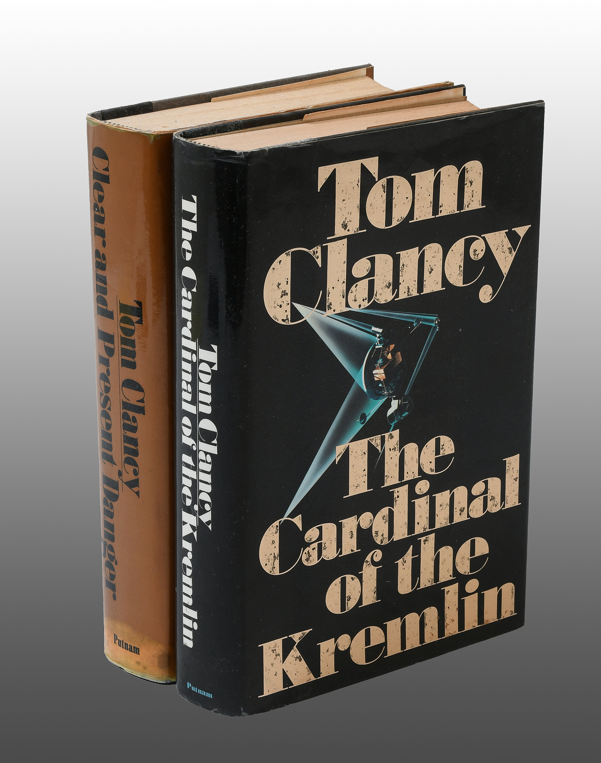 2 PC. TOM CLANCY AUTOGRAPHED BOOKS: