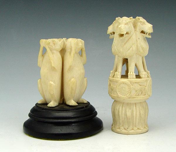 2 PIECE CARVED IVORY LIONS &