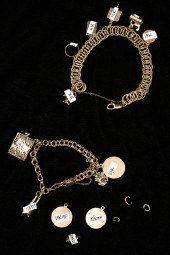 2 PIECE GOLD CHARM BRACELETS: