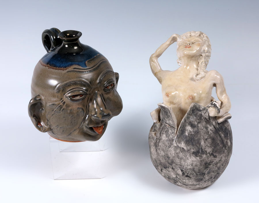 2 PIECE POTTERY FACE JUG &