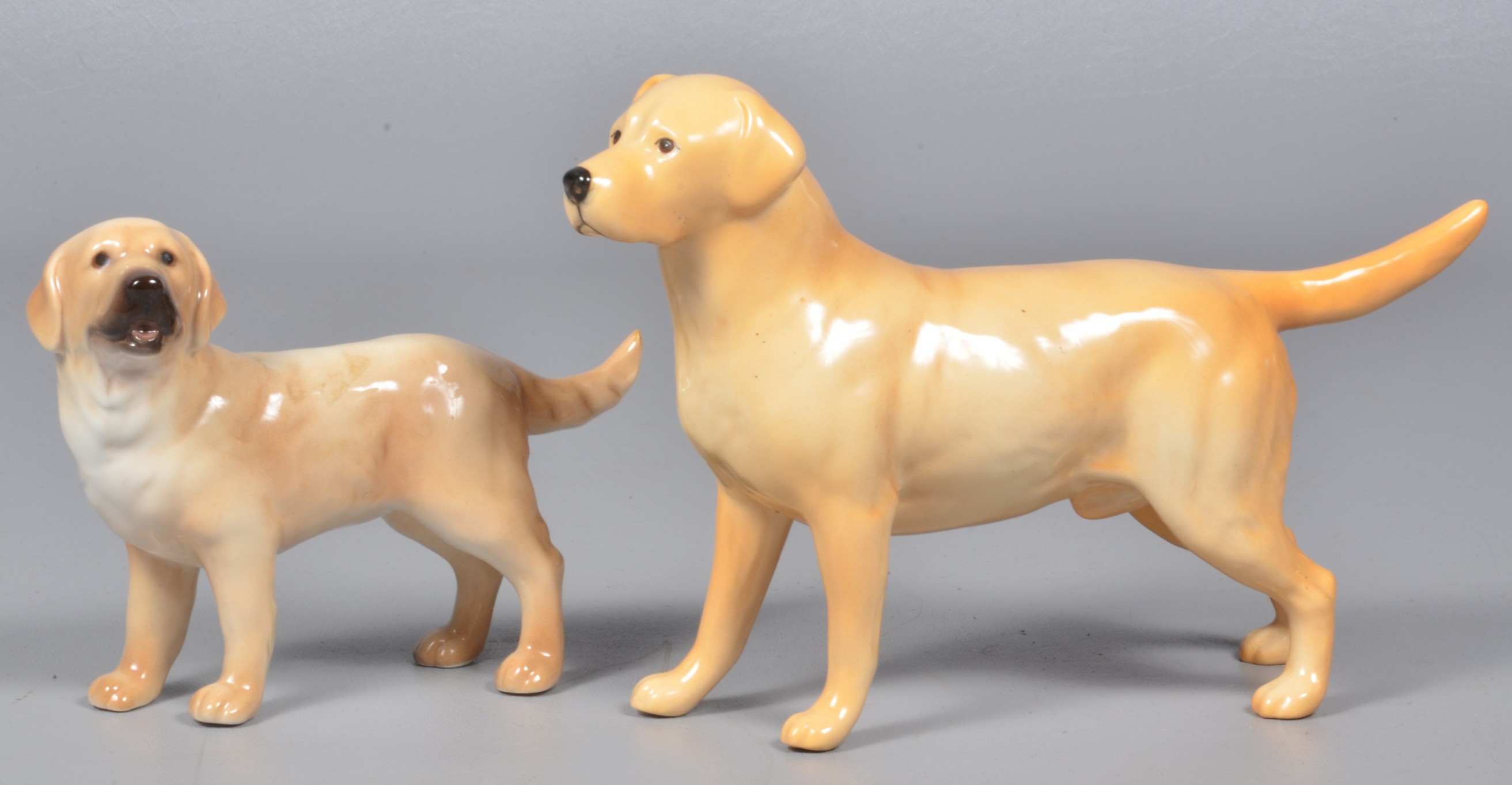 (2) Porcelain dog figures to