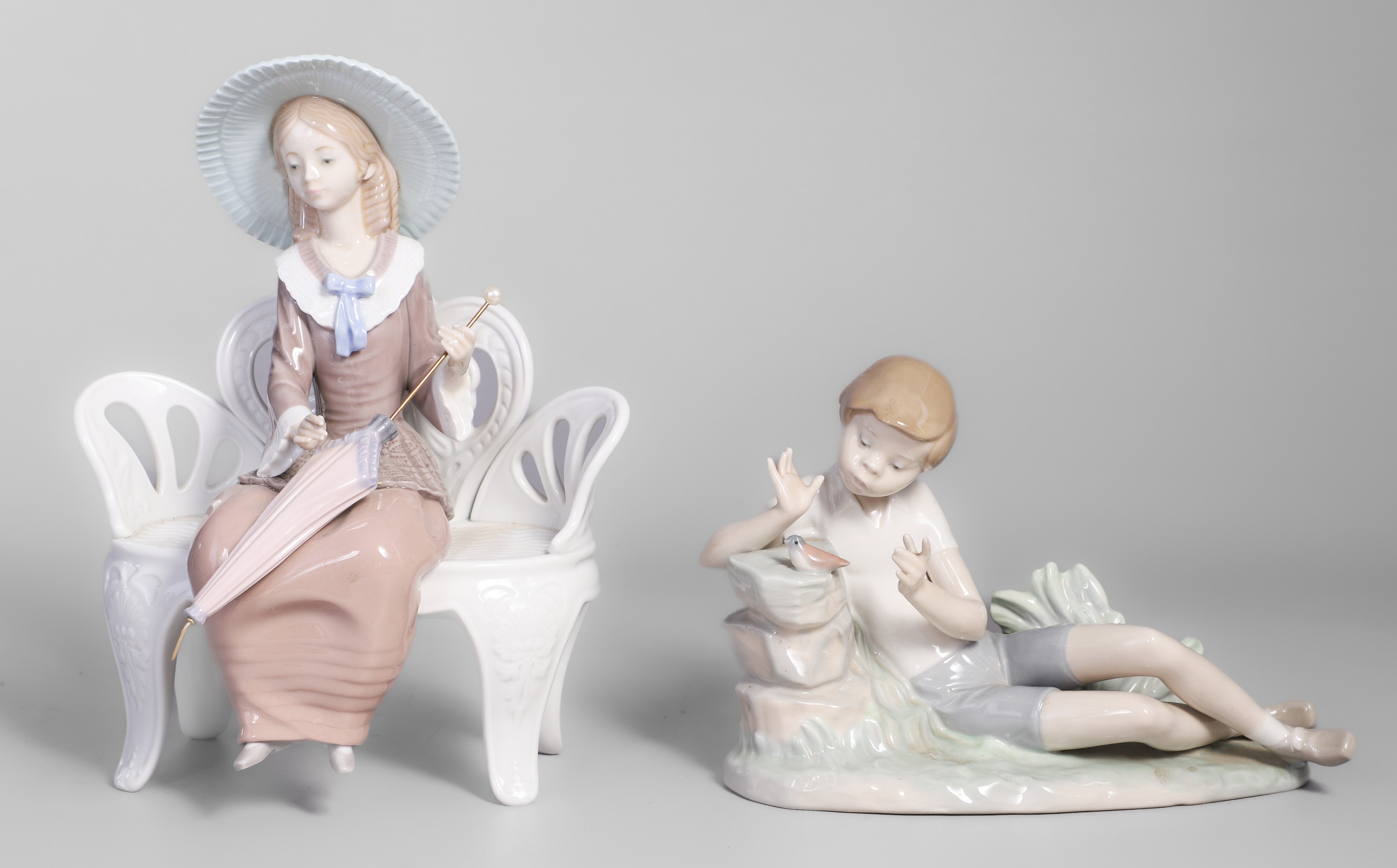 (2) Porcelain Lladro figurines to