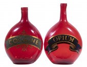 (2) RED APOTHECARY JARS - "COC