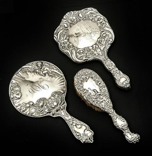 2 STERLING REPOUSSE HAND MIRRORS