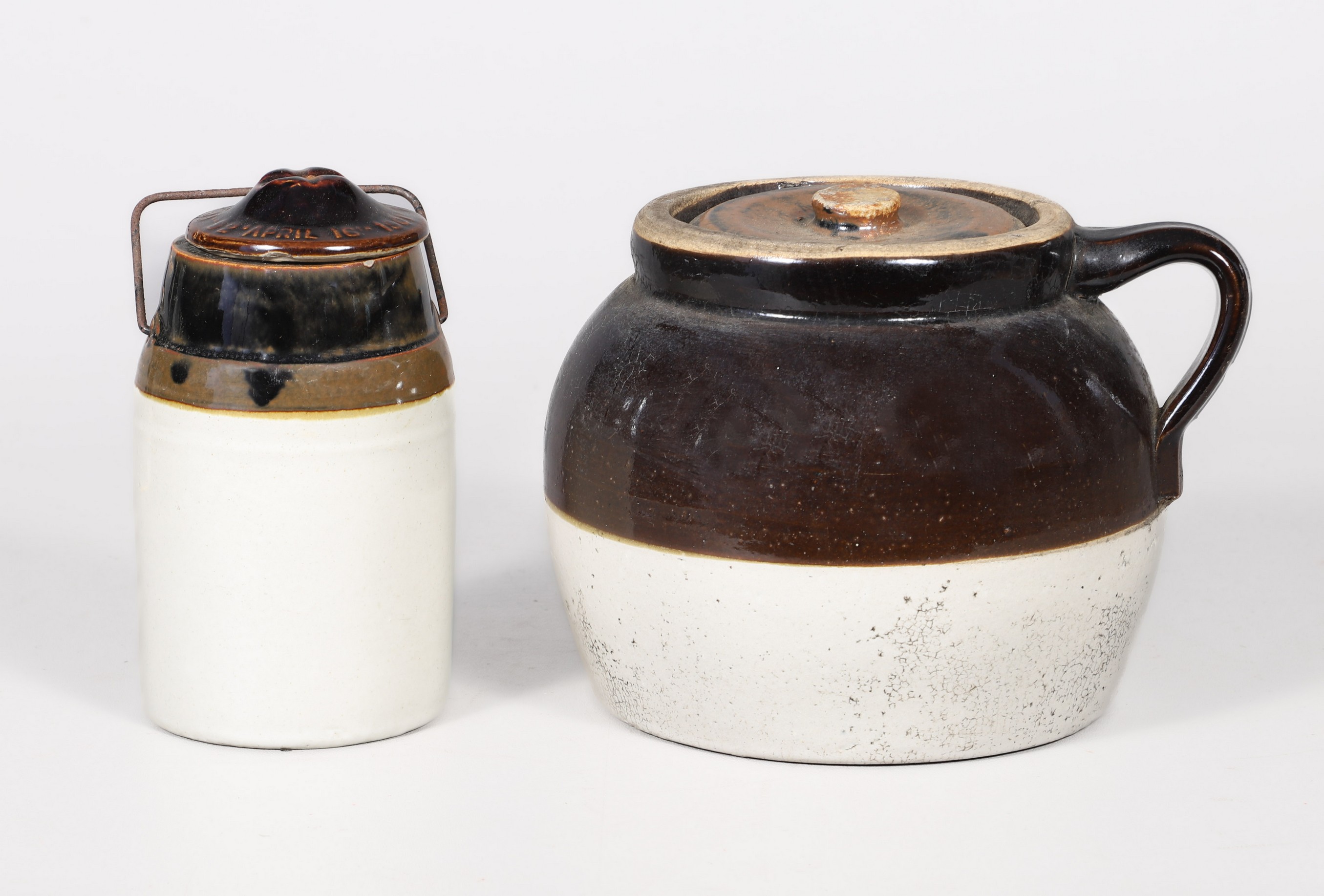 (2) Stoneware brown & tan crocks,