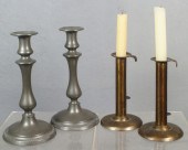 2 tin hogscraper candlesticks,