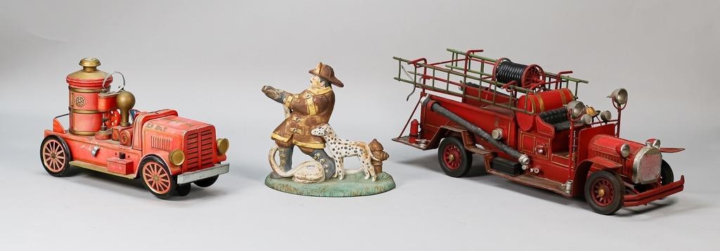 2 TOY FIRE TRUCKS AND FIREMAN