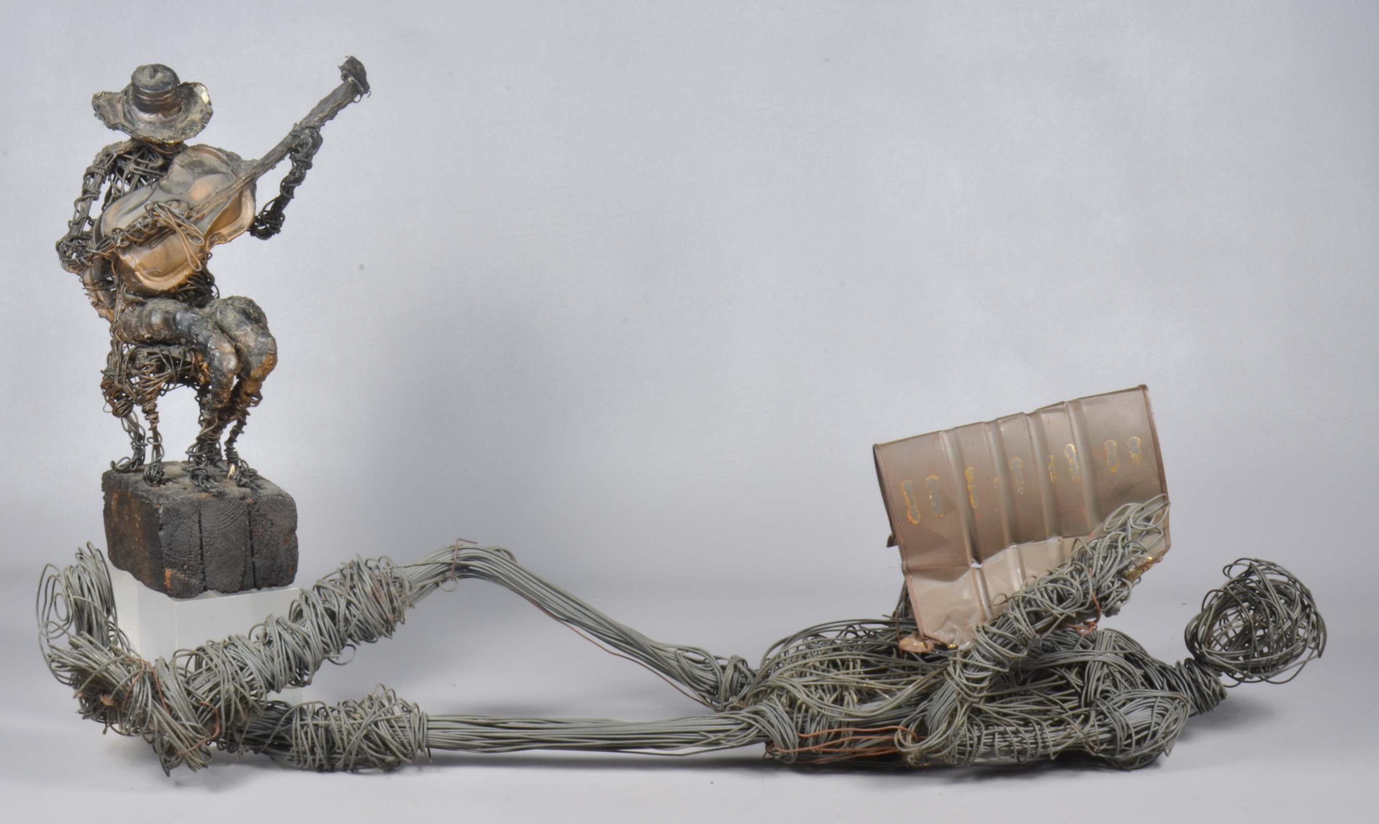 (2) Twisted wire sculptures,
