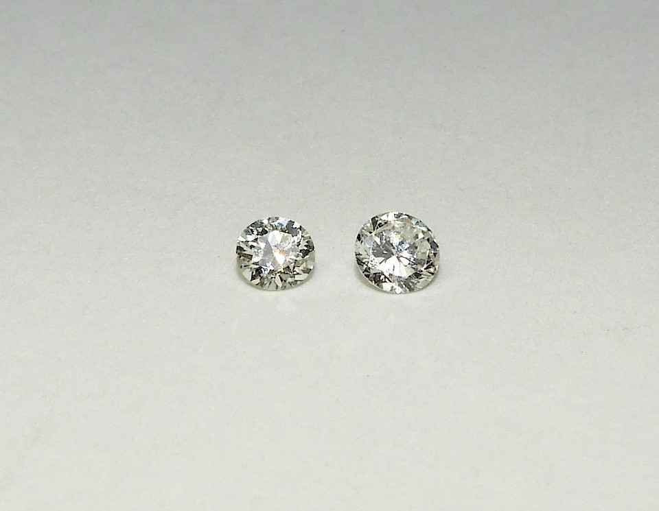 2 VERY FINE APPROX .25CT DIAMONDS