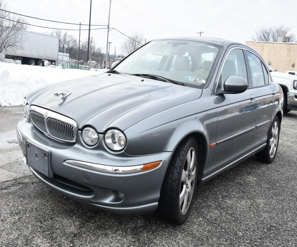 2004 Jaguar X-TYPE silver sedan, 