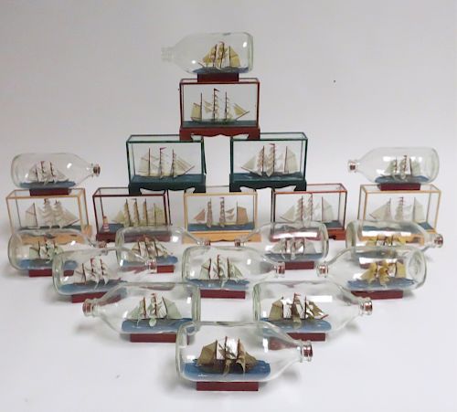 21 MINIATURE SHIP MODELS ENCASED IN