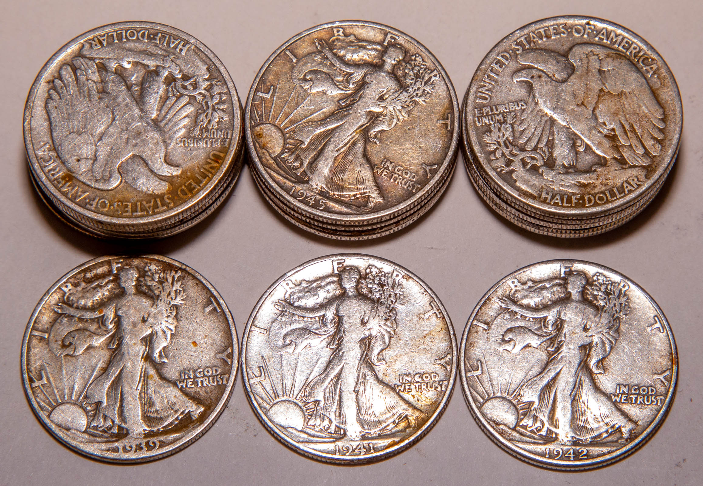 21 WALKING LIBERTY HALF DOLLARS .