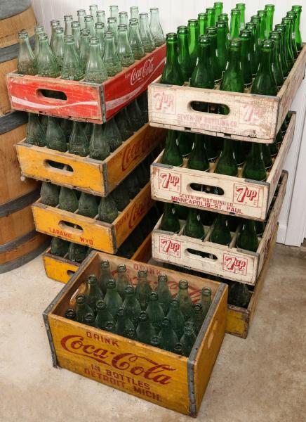 216 COKE AND 7-UP BOTTLES WITH 9