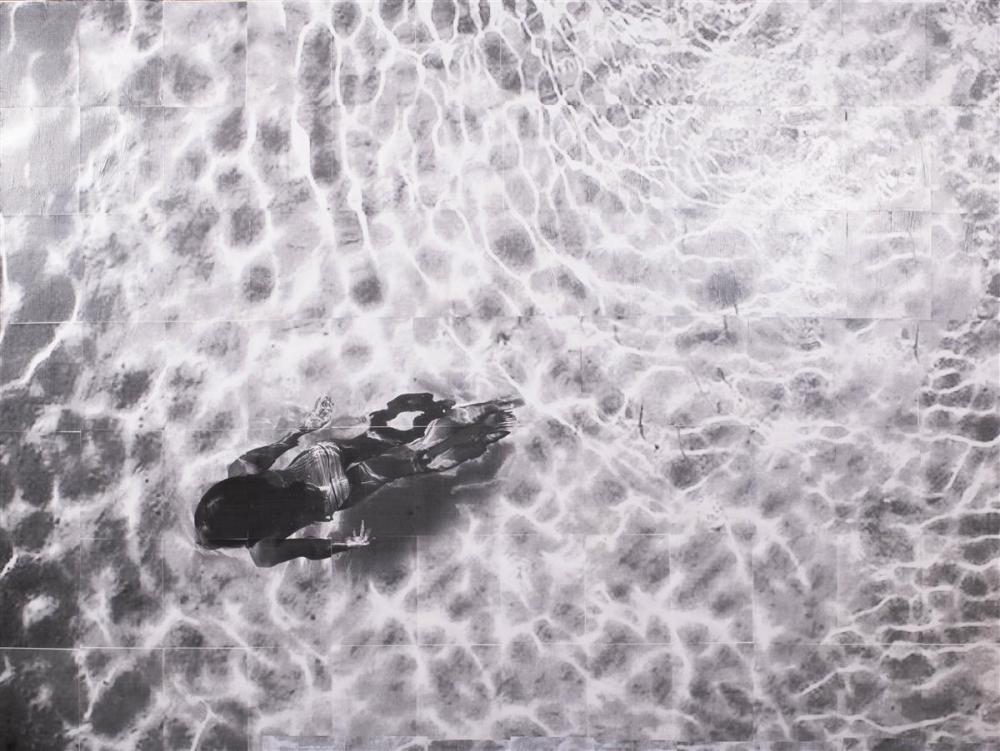 (21ST CENTURY) WOMAN IN A POOL