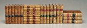 24 leather-bound books. Eight