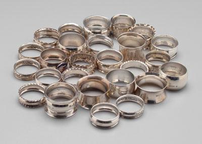 26 English silver napkin rings: