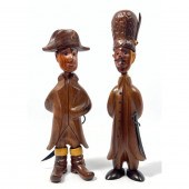2pc Ermanno carved wood figure