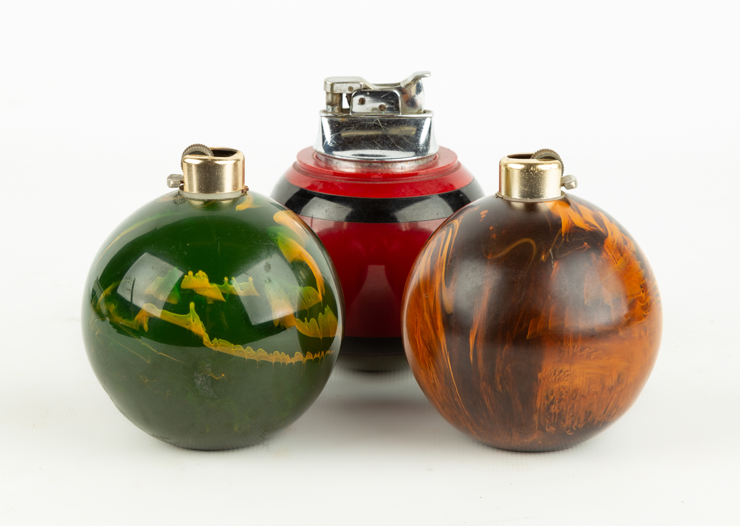 (3) BAKELITE LIGHTERS circa 1920.