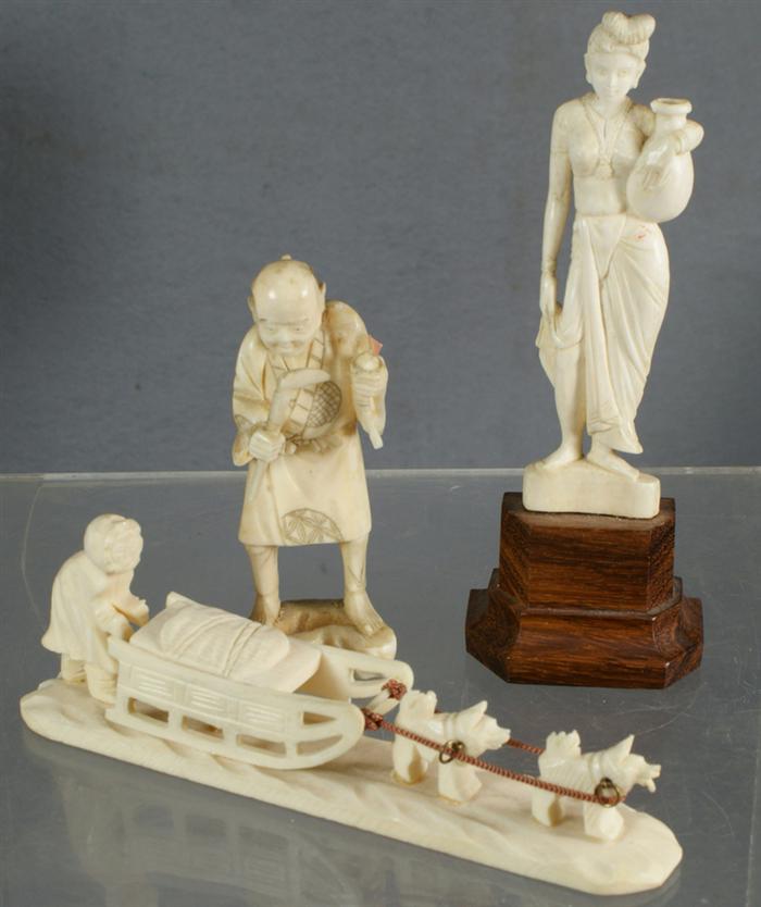 3 bone or ivory carving, dog