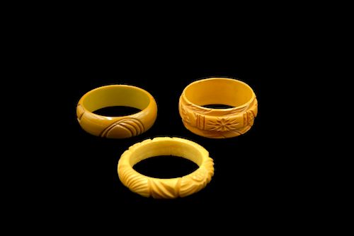 3 CARVED BUTTERSCOTCH BAKELITE
