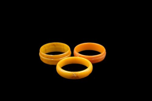 3 CARVED BUTTERSCOTCH BAKELITE