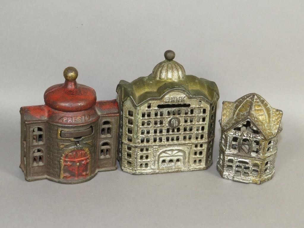 3 CAST IRON BUILDING BANKSca.