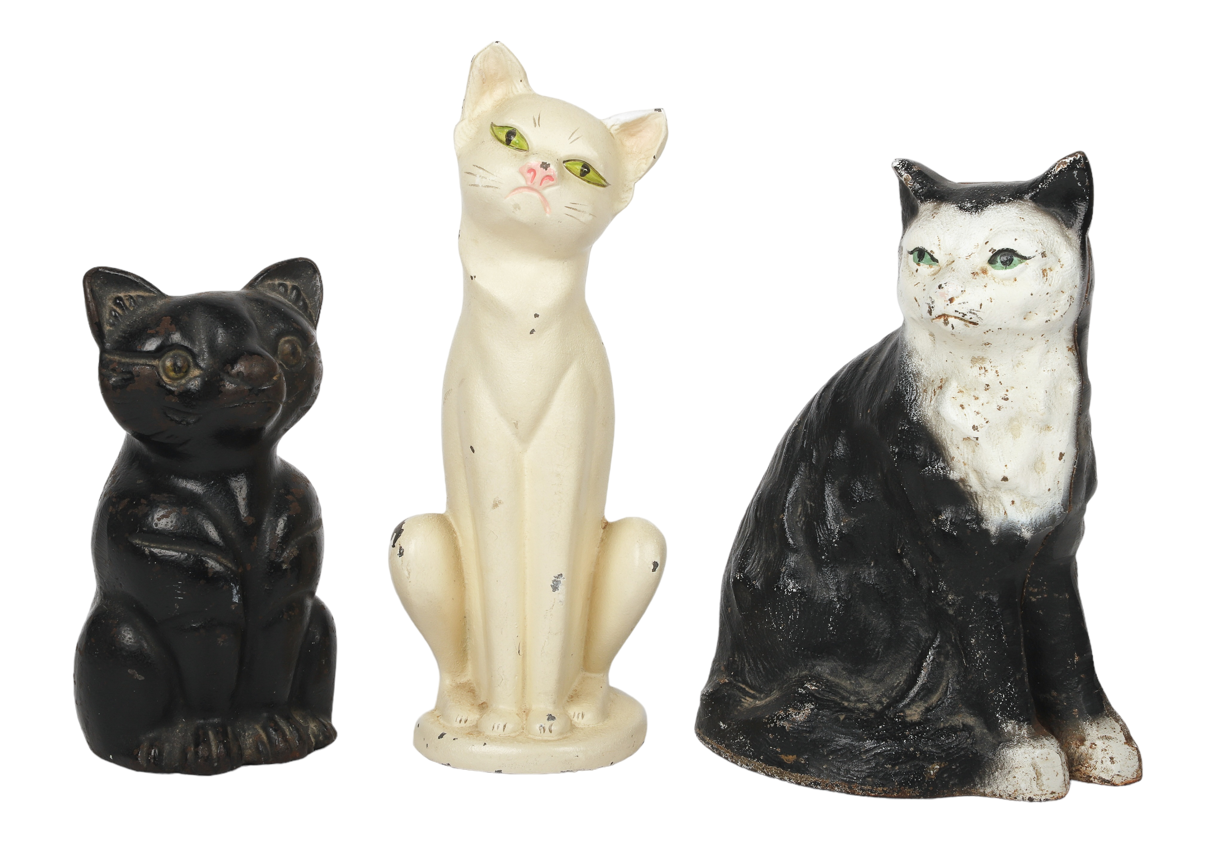 (3) Cast iron cat doorstops,